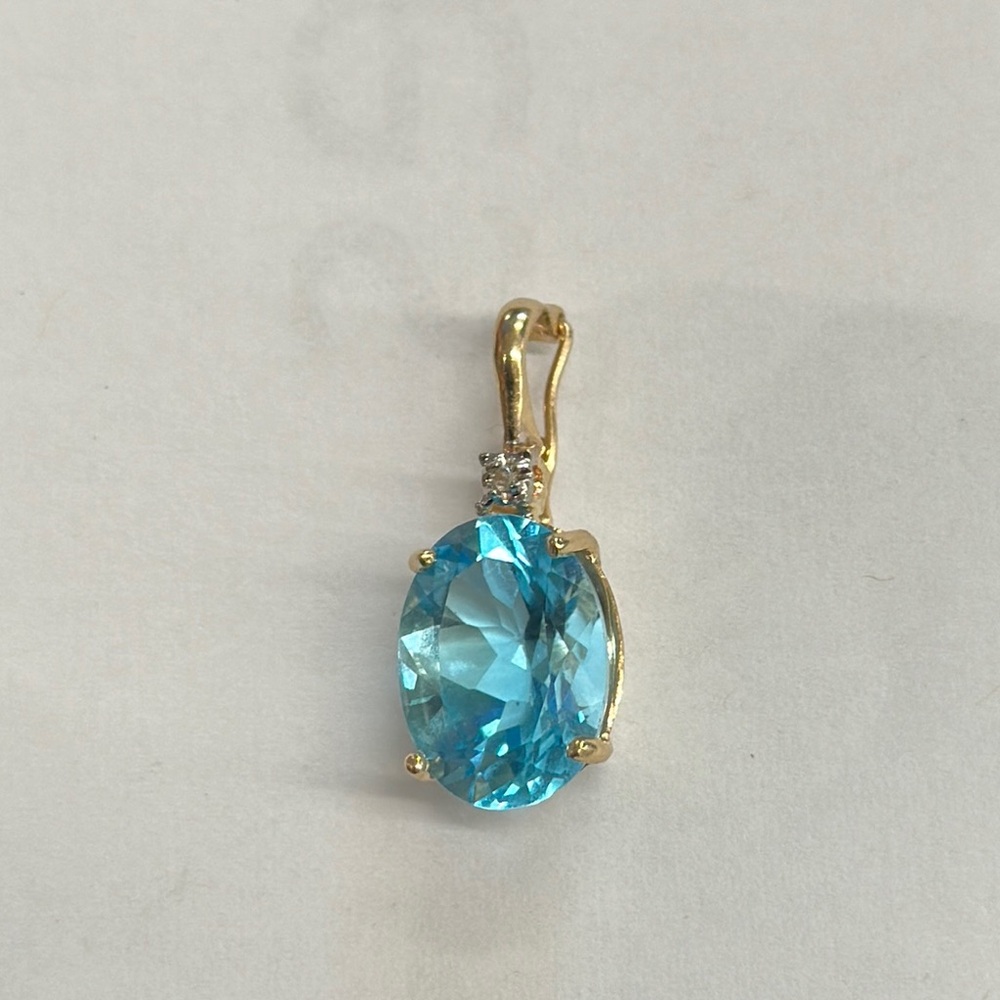 456475 14k topaz and white sapphire stones pendant.